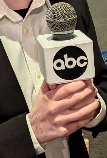 An ABC Mic flag for a Shure PGX2 Microphone, used in the show The Jury is Out... To Lunch!