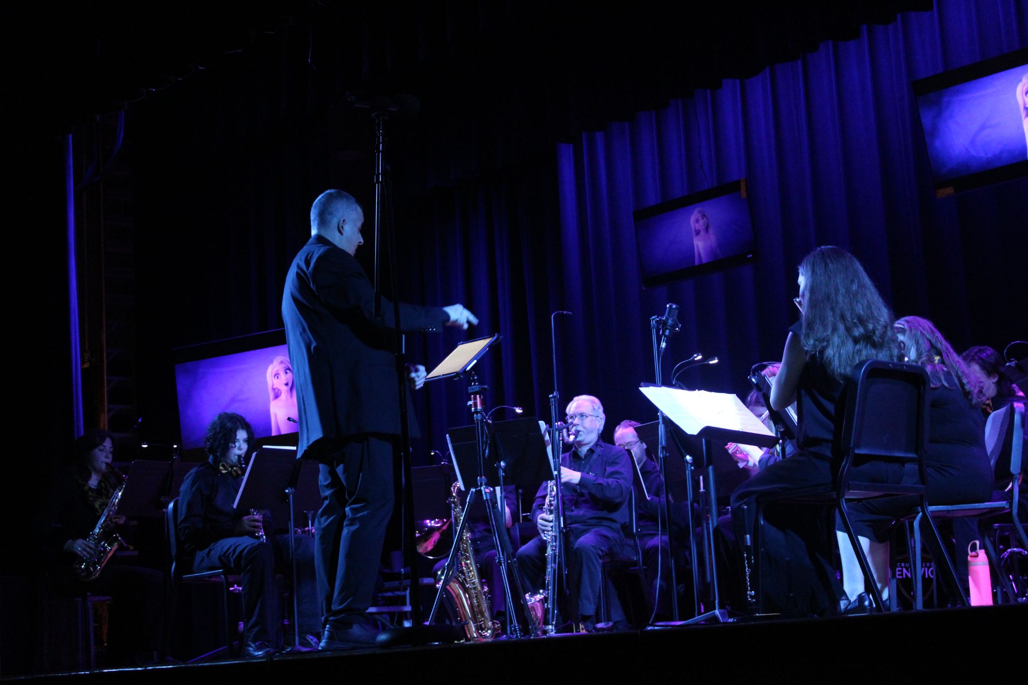 A production photo from the Fenwick Band's 2025 Spring Concert. For more details, contact Dave