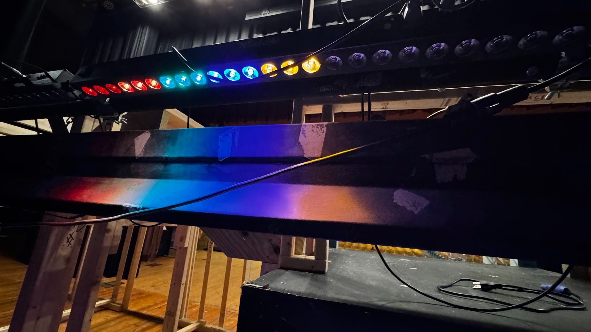 A bar light, hung on a pipe.