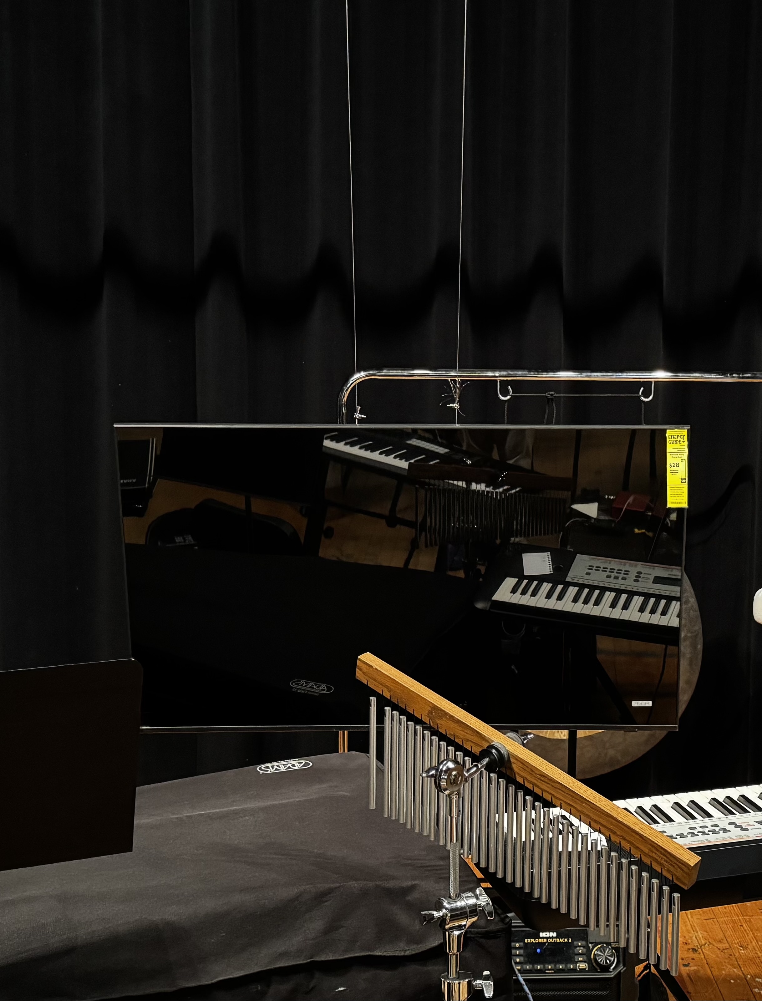 A TV flying a few feet above the stage using the apparatus made above.